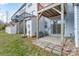 Backyard of a townhouse with a patio, balcony, and small shed at 331 Wilkes Place Dr, Fort Mill, SC 29715