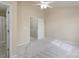 Bright bedroom featuring neutral walls, carpet, ceiling fan, and easy access to the bathroom at 331 Wilkes Place Dr, Fort Mill, SC 29715
