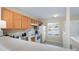 Cozy kitchen with white appliances, plenty of cabinets, and natural lighting at 331 Wilkes Place Dr, Fort Mill, SC 29715