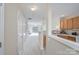 Open-concept living room with sliding doors to deck and cozy fireplace at 331 Wilkes Place Dr, Fort Mill, SC 29715