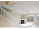 Bright living room showcasing a fireplace, deck access, and plush carpeting at 331 Wilkes Place Dr, Fort Mill, SC 29715