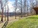 Beautiful lush backyard with mature trees offering serene views and privacy at 4130 Waterway Dr, Monroe, NC 28110