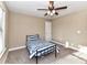 Bedroom with neutral carpet, ceiling fan, and a window providing natural light at 4130 Waterway Dr, Monroe, NC 28110