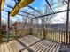 Beautiful outdoor deck with wooden railing and pergola-covered seating area at 4130 Waterway Dr, Monroe, NC 28110
