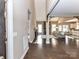 Spacious open-concept living room with hardwood floors, stone fireplace, and abundant natural light, ideal for entertaining at 4130 Waterway Dr, Monroe, NC 28110