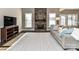 Inviting living room boasts a stone fireplace and neutral decor, creating a cozy atmosphere at 4130 Waterway Dr, Monroe, NC 28110