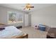Bedroom with carpet and a ceiling fan at 5902 Mt Holly Huntersville Rd, Charlotte, NC 28216