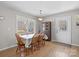 Inviting dining area with ample seating and natural light at 5902 Mt Holly Huntersville Rd, Charlotte, NC 28216