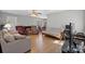 Bright living room featuring hardwood floors, and neutral colors at 5902 Mt Holly Huntersville Rd, Charlotte, NC 28216