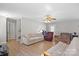 Spacious living room with hardwood floors, neutral walls, and ample natural light at 5902 Mt Holly Huntersville Rd, Charlotte, NC 28216