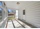 Screened porch with view of fenced backyard at 5902 Mt Holly Huntersville Rd, Charlotte, NC 28216