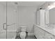 Neutrally decorated bathroom featuring a sleek shower with white subway tile at 700 Queen Charlottes Ct, Charlotte, NC 28211