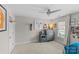 Bright bedroom with ceiling fan and natural light, featuring sports decor at 700 Queen Charlottes Ct, Charlotte, NC 28211
