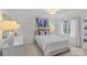 Bright bedroom with simple decor, natural light, and neutral color scheme at 700 Queen Charlottes Ct, Charlotte, NC 28211