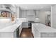 Stylish kitchen boasts custom cabinets, modern appliances, and sleek countertops at 700 Queen Charlottes Ct, Charlotte, NC 28211