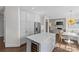 Spacious kitchen with large center island, stainless steel appliances, and hardwood floors throughout at 700 Queen Charlottes Ct, Charlotte, NC 28211