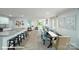 Dining room in an open floor plan with views of the living area and kitchen, perfect for modern living at 8043 Plymouth Rd, Sherrills Ford, NC 28673
