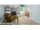 Bright office space with a large window, shelving and a wooden desk at 8043 Plymouth Rd, Sherrills Ford, NC 28673