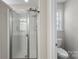Modern bathroom featuring a glass-enclosed shower, white fixtures, and ample space at 8211 Poplar Grove Cir # 31, Waxhaw, NC 28173