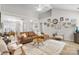 Spacious living room with vaulted ceilings, hardwood floors, and stylish furniture at 8211 Poplar Grove Cir # 31, Waxhaw, NC 28173
