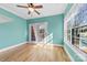 Bright bedroom featuring natural light from large windows and a door leading to a porch at 9016 Heather Trce, Gastonia, NC 28056