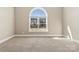 Bright bedroom with a large window and neutral carpet at 9016 Heather Trce, Gastonia, NC 28056