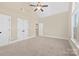 Bedroom featuring high ceilings, and a ceiling fan at 9016 Heather Trce, Gastonia, NC 28056