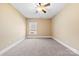 Neutral bedroom with a large window offering natural light and carpet at 9016 Heather Trce, Gastonia, NC 28056