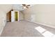 Bonus room features neutral carpet and multiple doors allowing for a flexible floor plan at 9016 Heather Trce, Gastonia, NC 28056