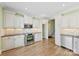 Updated kitchen featuring white cabinets, stainless steel appliances, and hardwood floors at 9016 Heather Trce, Gastonia, NC 28056
