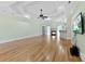 Expansive living room with hardwood floors, fireplace, wet bar, and tray ceiling at 9016 Heather Trce, Gastonia, NC 28056
