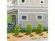 Cozy backyard patio with seating area and lush greenery, perfect for relaxing outdoors at 113 Alluvium Ln, Waxhaw, NC 28173