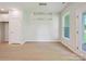 Open-concept dining room featuring a modern chandelier and a view of the outdoors at 113 Alluvium Ln, Waxhaw, NC 28173