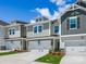 Charming townhouses with well-manicured lawns and attached garages, a desirable neighborhood at 113 Alluvium Ln, Waxhaw, NC 28173