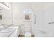 Bathroom with tiled shower, grab bars, and neutral finishes at 116 Miller Farm Rd, Statesville, NC 28625
