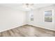 Bedroom with wood-look flooring, neutral walls and ceiling fan at 116 Miller Farm Rd, Statesville, NC 28625