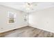 Light and airy bedroom features two windows and neutral finishes at 116 Miller Farm Rd, Statesville, NC 28625