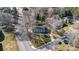Aerial view of a traditional home nestled among mature trees in a quiet neighborhood at 1221 20Th Nw Ave, Hickory, NC 28601