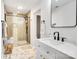 Modern bathroom featuring a vanity, framed mirror, sleek hardware and a tiled shower at 1221 20Th Nw Ave, Hickory, NC 28601