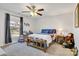 Bright bedroom featuring a ceiling fan, window and neutral decor with light color scheme at 1221 20Th Nw Ave, Hickory, NC 28601