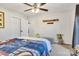 Bright bedroom featuring a ceiling fan, closet and neutral decor with a cool color scheme at 1221 20Th Nw Ave, Hickory, NC 28601