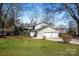 Charming home features a spacious backyard and an attached three-car garage at 1221 20Th Nw Ave, Hickory, NC 28601