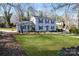 Inviting two-story home with a spacious front yard and beautiful landscaping at 1221 20Th Nw Ave, Hickory, NC 28601