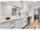 Modern kitchen with white cabinets, stainless steel appliances, and sleek countertops at 1221 20Th Nw Ave, Hickory, NC 28601