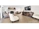 Relaxing living room features hardwood floors, a fireplace, and entertainment center at 1221 20Th Nw Ave, Hickory, NC 28601