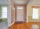 Welcoming foyer boasts hardwood floors and natural light at 139 Tenth Green Ct, Statesville, NC 28625
