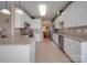 Bright kitchen with granite countertops, white cabinets, and stainless steel appliances at 139 Tenth Green Ct, Statesville, NC 28625