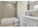 Elegant bathroom showcasing modern vanity, tiled shower/tub, and contemporary fixtures at 141 Ark St, Kings Mountain, NC 28086
