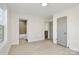 Bedroom showcasing neutral walls, wood-look floors, and an ensuite bathroom at 141 Ark St, Kings Mountain, NC 28086