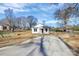 Beautifully renovated home with a spacious front yard and modern driveway, perfect for comfortable living at 141 Ark St, Kings Mountain, NC 28086